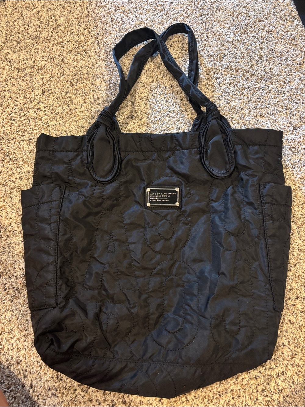Black Quilted Tote Bag with Tag Accent